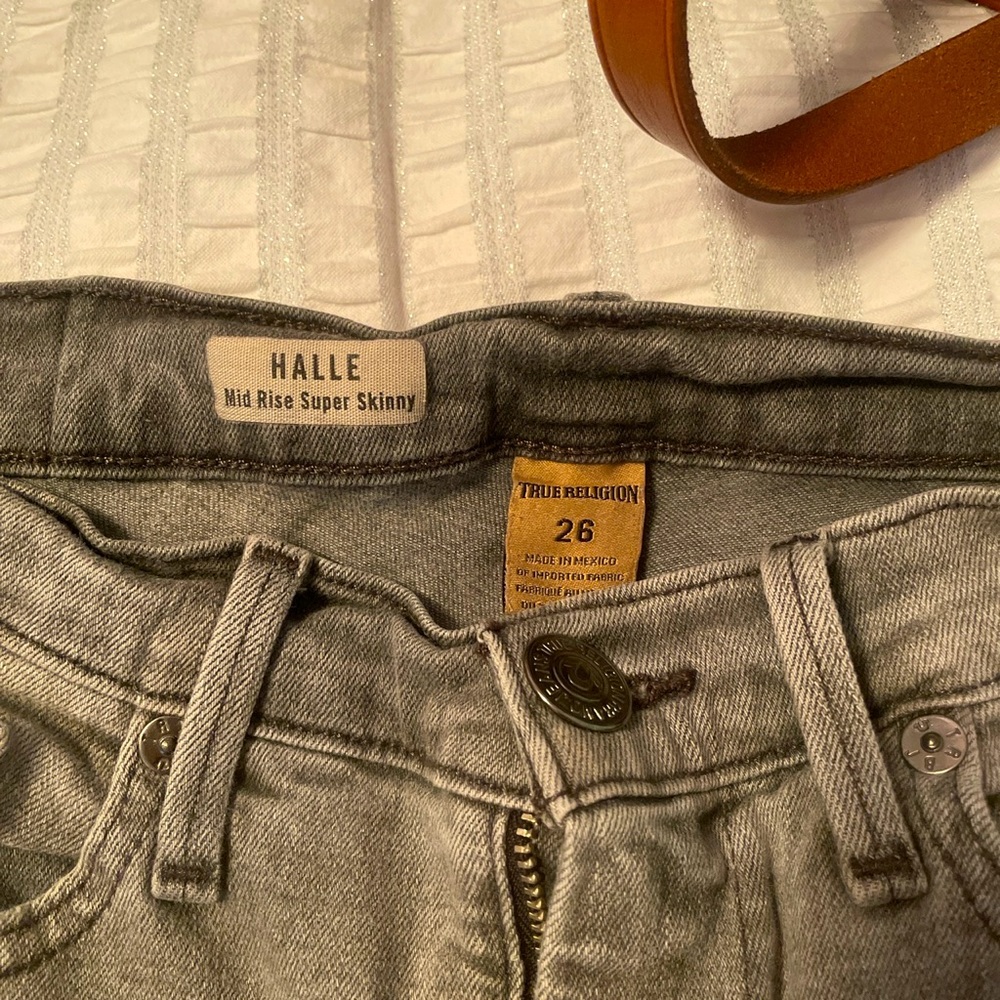 Washed gray distressed True Religion jeans